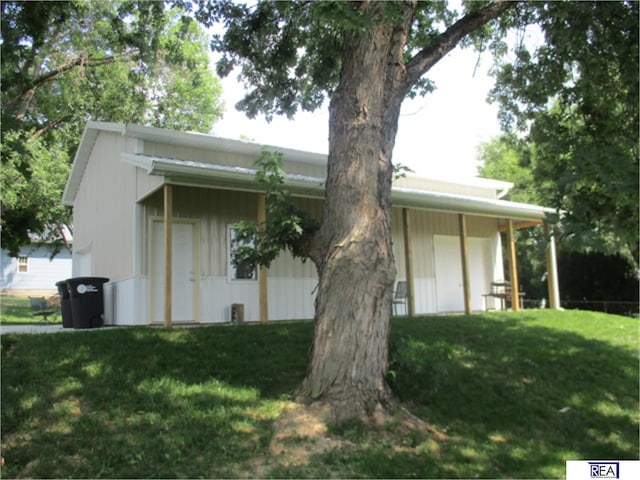 4521 A St, Omaha, NE 68106 - view of home's exterior with a lawn