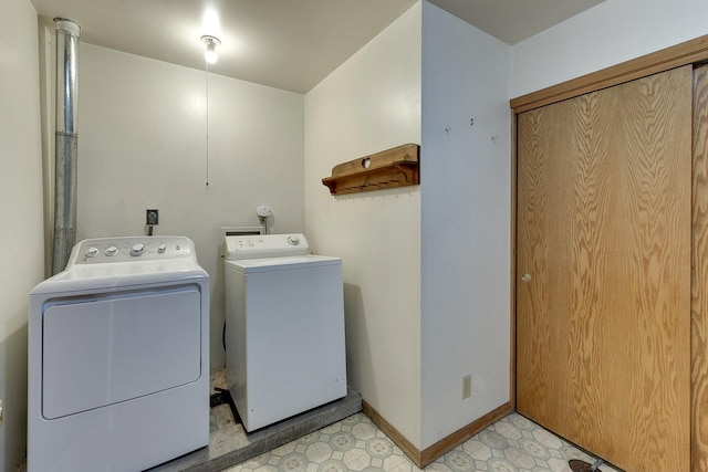 4128 State St, Omaha, NE 68112 - laundry area with washing machine and dryer and light flooring