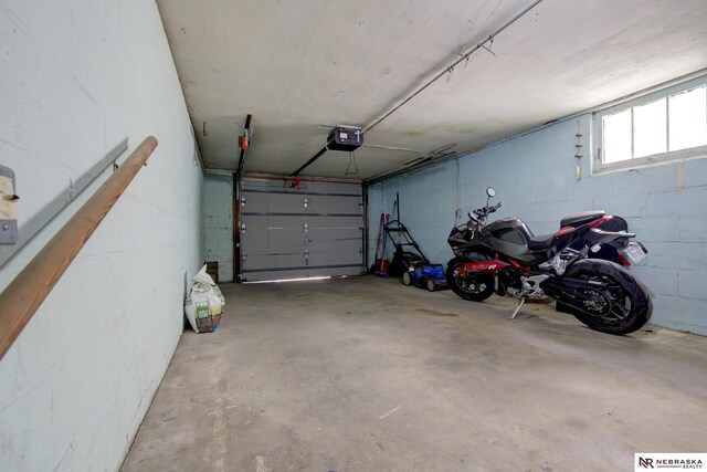 5042 Corby St, Omaha, NE 68104 - garage with a garage door opener