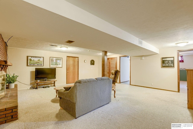 280 N 8th St, Springfield, NE 68059 - living area with carpet floors, a textured ceiling, and a fireplace