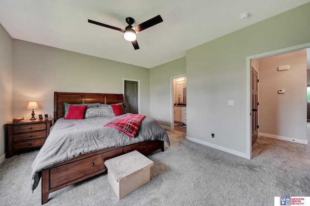 8178 Regent Dr, Lincoln, NE 68507 - carpeted bedroom with ensuite bath and ceiling fan