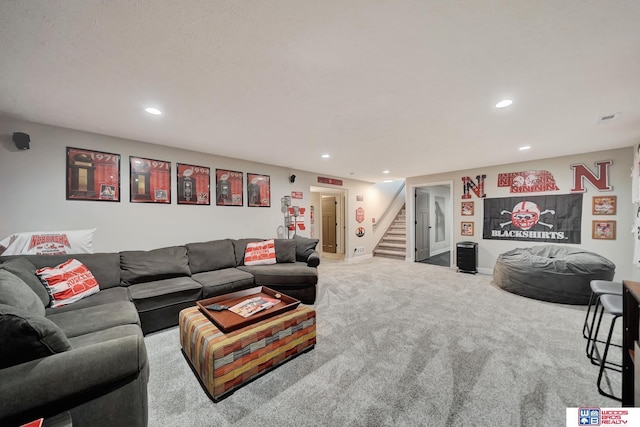 8178 Regent Dr, Lincoln, NE 68507 - carpeted living area with recessed lighting and stairs