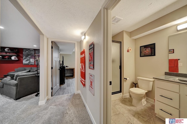8178 Regent Dr, Lincoln, NE 68507 - corridor with a textured ceiling and baseboards