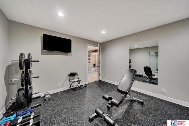 8178 Regent Dr, Lincoln, NE 68507 - workout room featuring recessed lighting and baseboards