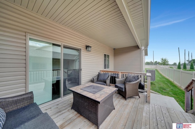 8178 Regent Dr, Lincoln, NE 68507 - wooden terrace featuring a fenced backyard and an outdoor hangout area