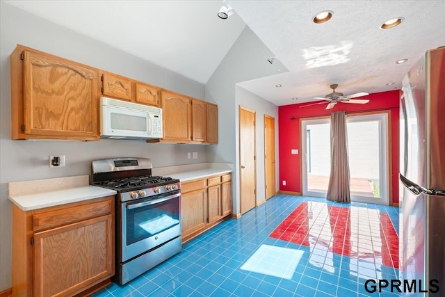 3018 Frederick St S, Omaha, NE 68105 - kitchen with stainless steel appliances, light countertops, lofted ceiling, ceiling fan, and recessed lighting