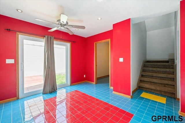 3018 Frederick St S, Omaha, NE 68105 - unfurnished room with ceiling fan, stairway, and tile patterned floors