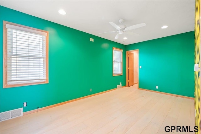 3018 Frederick St S, Omaha, NE 68105 - spare room featuring a ceiling fan, wood finished floors, and recessed lighting