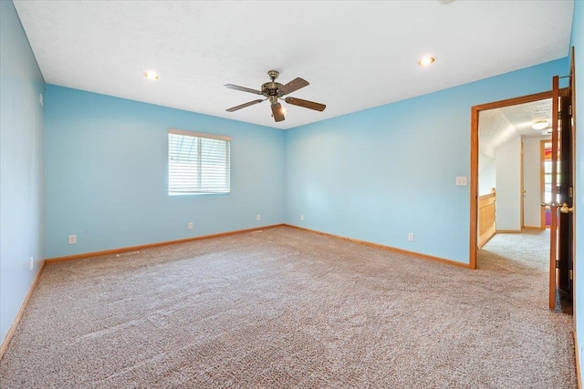 3018 Frederick St S, Omaha, NE 68105 - carpeted spare room with a ceiling fan and baseboards