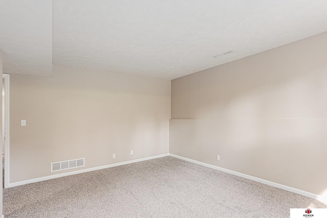 7420 S St S Unit 13, Lincoln, NE 68506 - carpeted spare room featuring baseboards