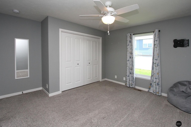 320 Woodland Blvd, Hickman, NE 68372 - unfurnished bedroom featuring carpet flooring, a closet, and ceiling fan