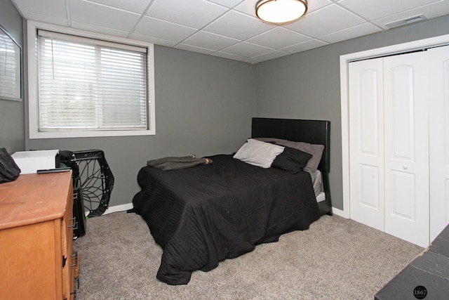 320 Woodland Blvd, Hickman, NE 68372 - bedroom with carpet floors, a closet, and a drop ceiling
