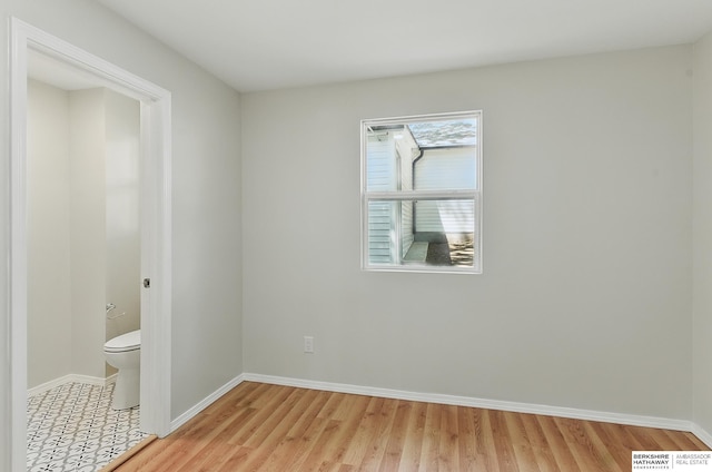 3410 U St, Omaha, NE 68107 - unfurnished bedroom with light wood-type flooring and baseboards