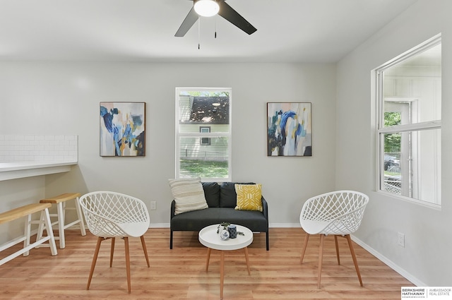 3410 U St, Omaha, NE 68107 - living area featuring wood finished floors and a ceiling fan