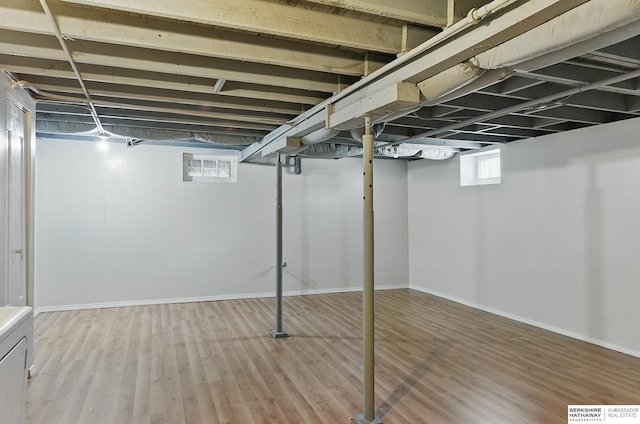 3410 U St, Omaha, NE 68107 - below grade area featuring wood finished floors
