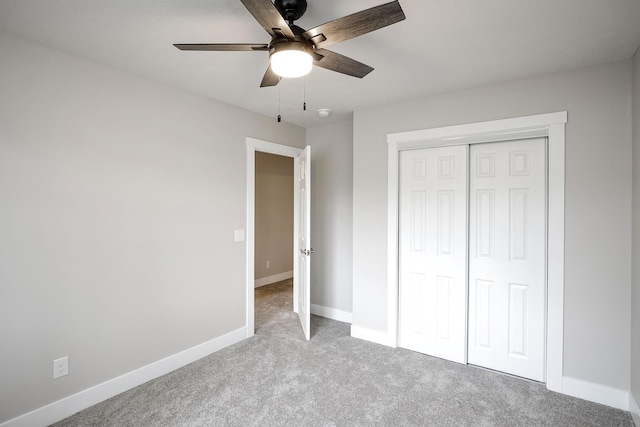 5445 S 51st St, Omaha, NE 68117 - unfurnished bedroom featuring carpet, a closet, and ceiling fan