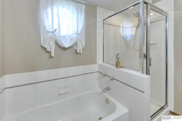 6705 Hillcrest Ln, La Vista, NE 68128 - bathroom with a stall shower and a bath