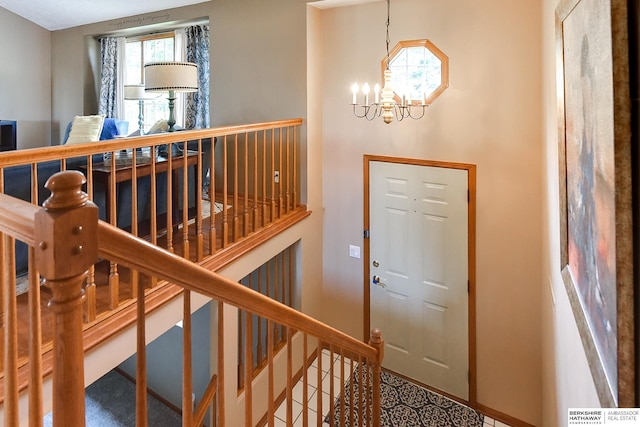 6705 Hillcrest Ln, La Vista, NE 68128 - entryway featuring a chandelier and baseboards