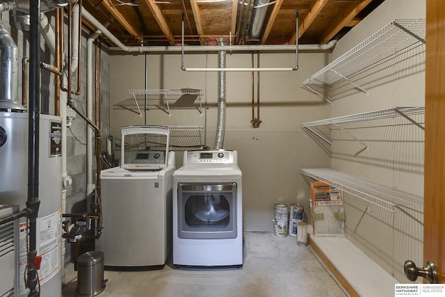6705 Hillcrest Ln, La Vista, NE 68128 - laundry area with washer and clothes dryer and water heater