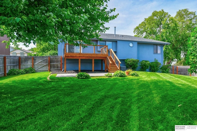 6705 Hillcrest Ln, La Vista, NE 68128 - back of house featuring stairs, a fenced backyard, and a deck