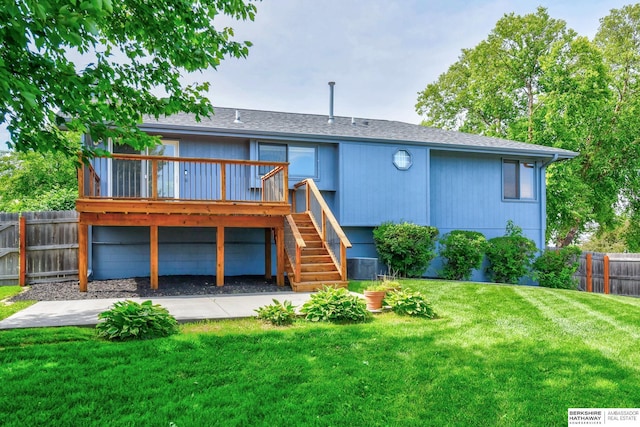 6705 Hillcrest Ln, La Vista, NE 68128 - rear view of house with stairway, a fenced backyard, and a deck