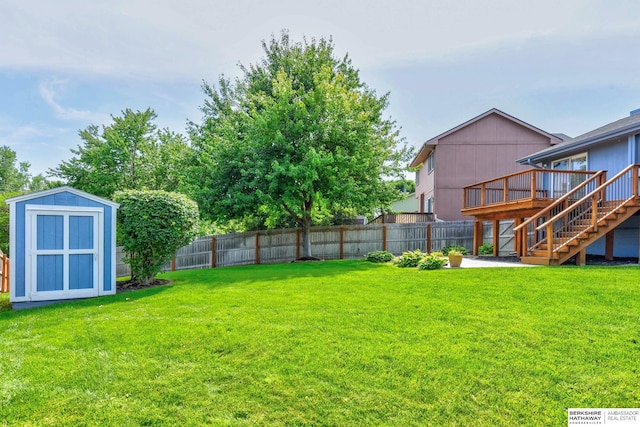 6705 Hillcrest Ln, La Vista, NE 68128 - fenced backyard with a shed, stairs, and a deck