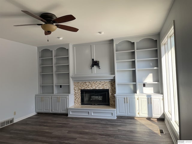 13406 Erskine St, Omaha, NE 68164 - unfurnished living room with a ceiling fan, dark wood-style floors, a fireplace with raised hearth, and recessed lighting