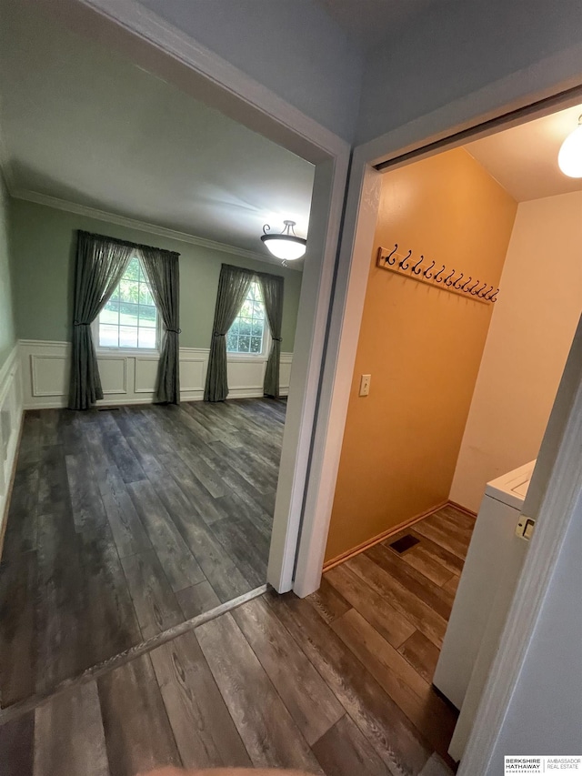 13406 Erskine St, Omaha, NE 68164 - hall with ornamental molding, dark wood-style flooring, and a wainscoted wall