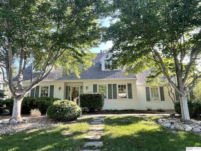 13406 Erskine St, Omaha, NE 68164 - cape cod home featuring a shingled roof and a front yard