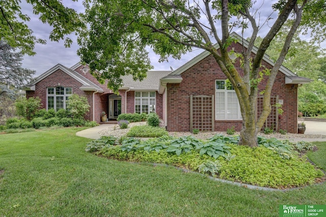 5850 Country Squire Plz, Omaha, NE 68152 - view of front of home featuring a front yard and brick siding