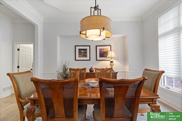 5850 Country Squire Plz, Omaha, NE 68152 - dining space featuring light wood-style floors and crown molding