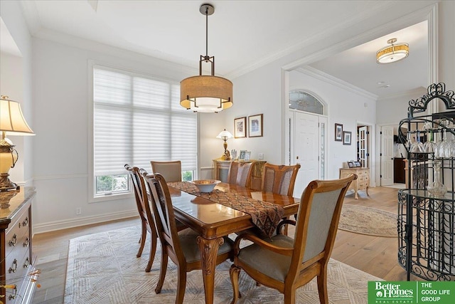 5850 Country Squire Plz, Omaha, NE 68152 - dining room with light wood-style floors and ornamental molding