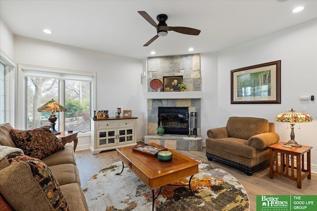 5850 Country Squire Plz, Omaha, NE 68152 - living room with light wood-type flooring, a ceiling fan, a fireplace, and recessed lighting