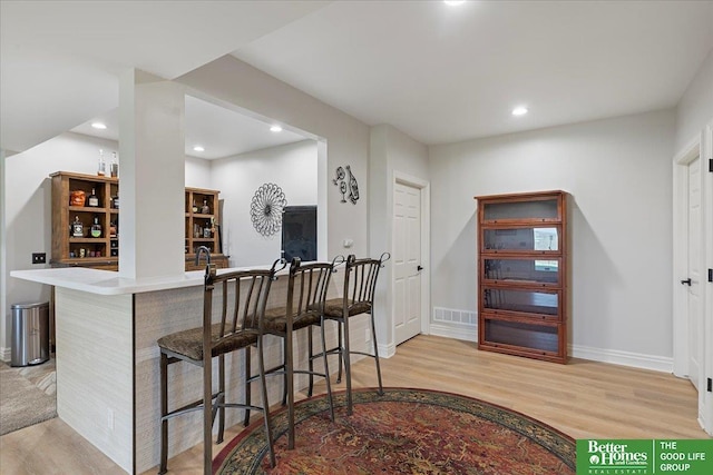 5850 Country Squire Plz, Omaha, NE 68152 - indoor bar with light wood-style floors and recessed lighting