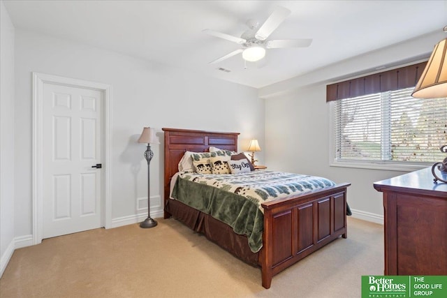 5850 Country Squire Plz, Omaha, NE 68152 - bedroom with light carpet and a ceiling fan