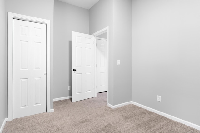 1204 S 27th St, Omaha, NE 68105 - unfurnished bedroom with carpet floors and a closet