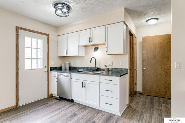 5424 Canterbury Ln Unit 5424, Lincoln, NE 68512 - kitchen featuring stainless steel dishwasher, wood finished floors, white cabinets, a textured ceiling, and dark stone countertops