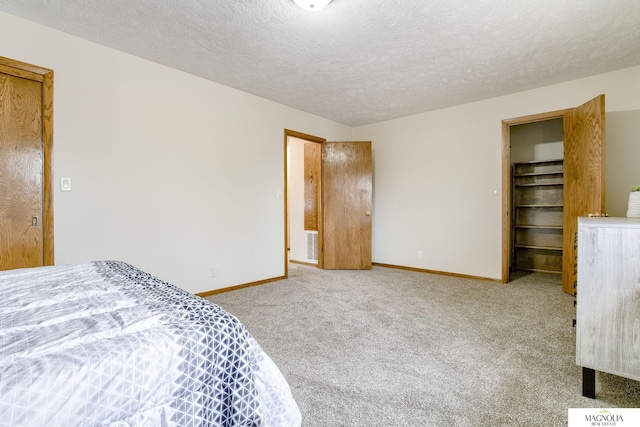 5424 Canterbury Ln Unit 5424, Lincoln, NE 68512 - bedroom featuring carpet flooring and a textured ceiling