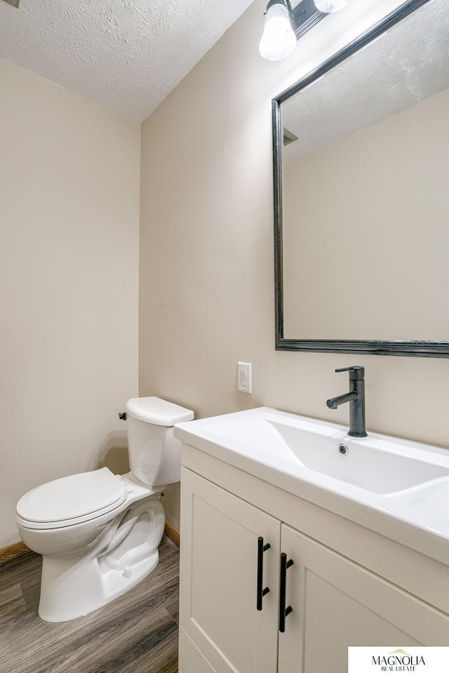 5424 Canterbury Ln Unit 5424, Lincoln, NE 68512 - bathroom featuring vanity and a textured ceiling