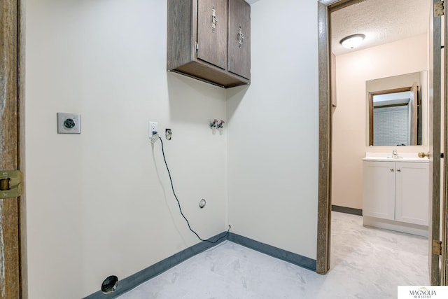 5424 Canterbury Ln Unit 5424, Lincoln, NE 68512 - laundry room with cabinet space and washer hookup