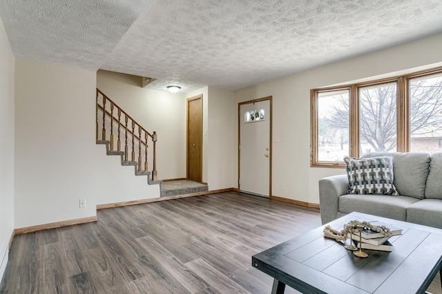 5424 Canterbury Ln Unit 5424, Lincoln, NE 68512 - living area featuring wood finished floors, a textured ceiling, and stairs