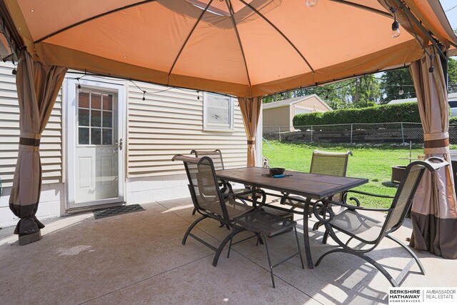 3605 N 67th Ave, Omaha, NE 68104 - view of patio / terrace featuring a gazebo and outdoor dining area