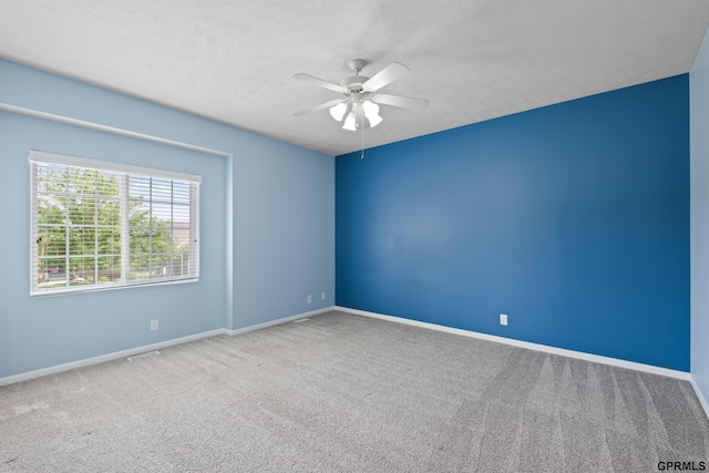 6736 S 191st St, Omaha, NE 68135 - unfurnished room featuring a ceiling fan, carpet, and a textured ceiling