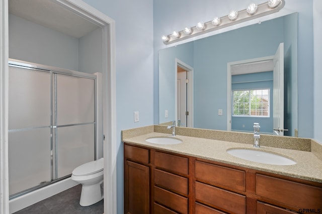 6736 S 191st St, Omaha, NE 68135 - bathroom with double vanity, a shower stall, and tile patterned floors