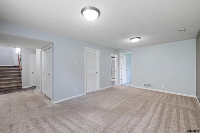 6736 S 191st St, Omaha, NE 68135 - carpeted spare room with stairs and baseboards