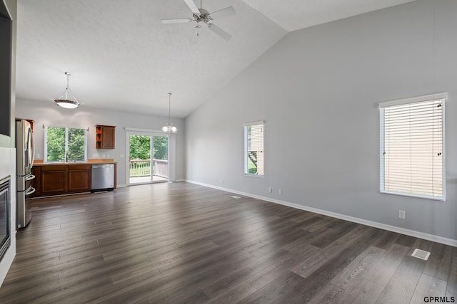 6736 S 191st St, Omaha, NE 68135 - unfurnished living room with high vaulted ceiling, ceiling fan, dark wood-style floors, and a chandelier