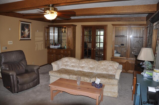 1017 N 129th Cir, Omaha, NE 68154 - living area featuring carpet flooring, french doors, beamed ceiling, and ceiling fan