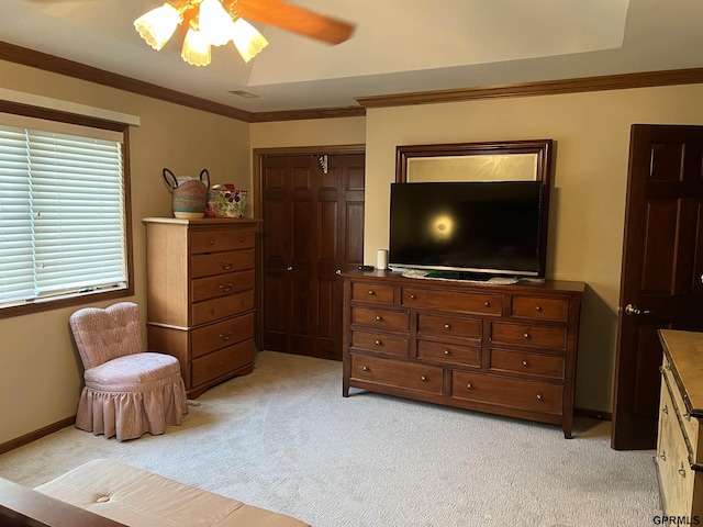 1017 N 129th Cir, Omaha, NE 68154 - bedroom with light carpet, a closet, crown molding, and a ceiling fan
