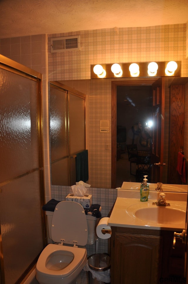 1017 N 129th Cir, Omaha, NE 68154 - full bath with vanity, a shower stall, and wallpapered walls