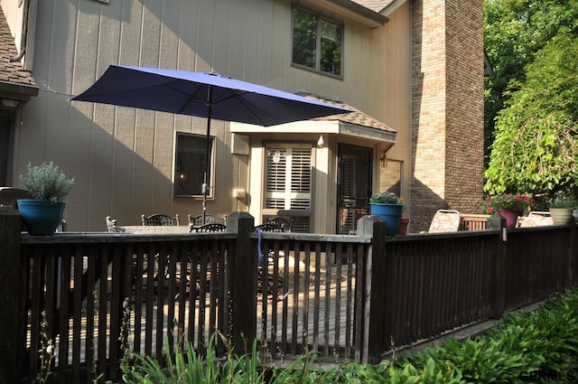1017 N 129th Cir, Omaha, NE 68154 - rear view of house with a chimney
